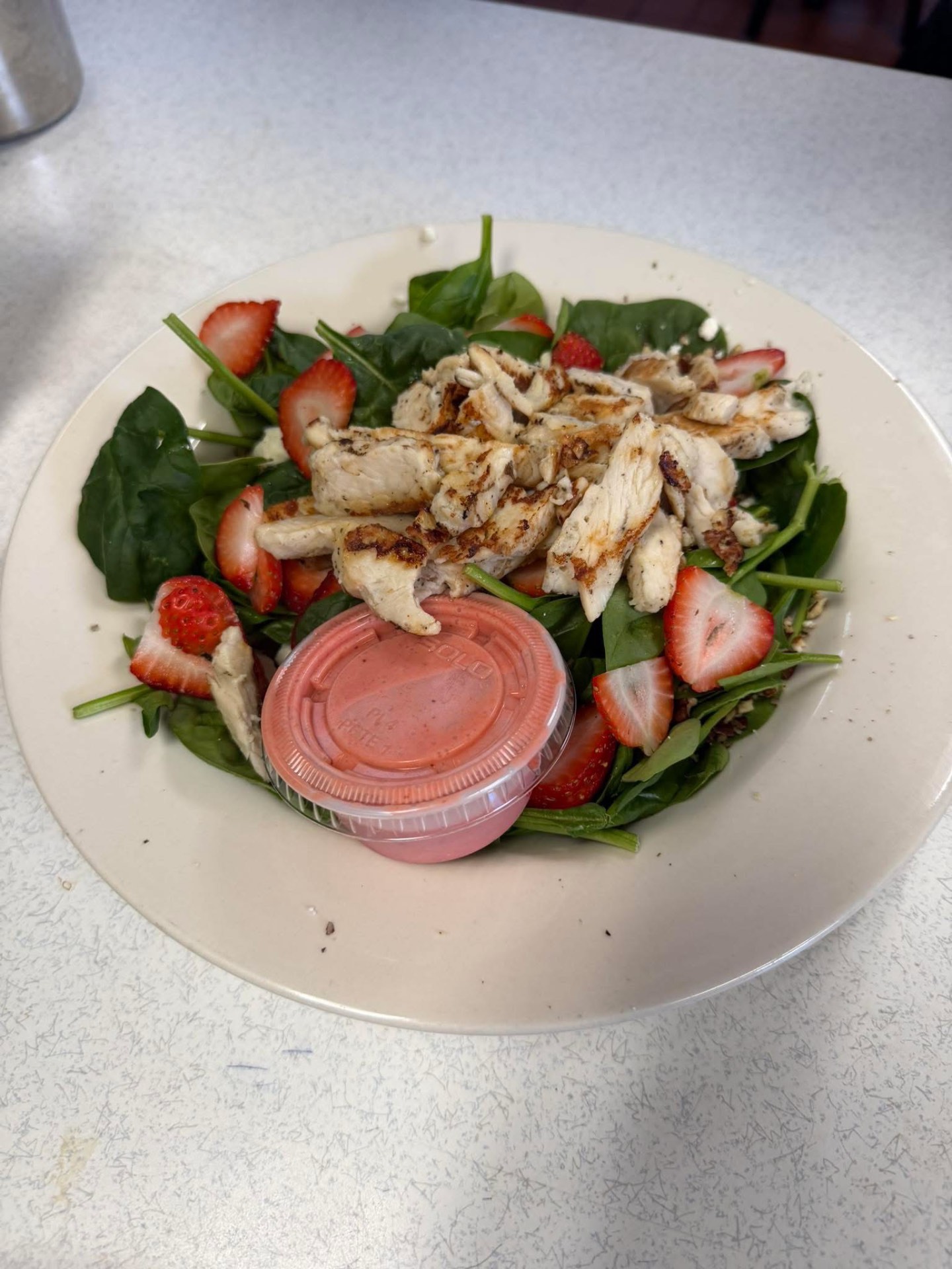 Grilled chicken and strawberry spinach salad